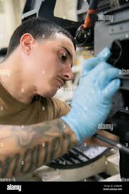 Aviation Ordnanceman 3rd Class Ivan Suarez (right), from Parier,  California, and Aviation Electrician's Mate 3rd Class Rocio Ponce, from  Elmonte, California, both assigned to USS Gerald R. Ford's (CVN 78)  aircraft intermediate