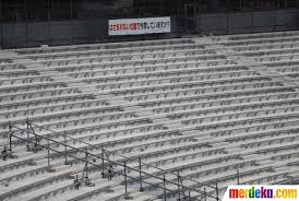 Tokyo national stadium atau new national stadium merupakan stadion yang sama dengan venue utama saat jepang menggelar olimpiade tahun 1964. Foto Melihat Lebih Dekat Pembangunan Stadion Olimpiade Tokyo 2020 Merdeka Com