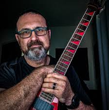 Mastodon's Brent Hinds slams "dumb dickhead" who made his plexiglass Flying  V guitar, Kevin Burkett of Electrical Guitar Company.