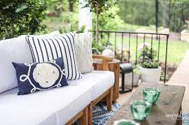 Add a fire pit to ensure you can enjoy your patio year round. Summer Decorating Porch And Patio Ideas Video For Stylish Outdoor Spaces