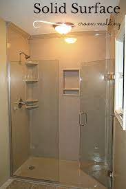 How To Choose The Right Accessories For A Solid Surface Shower Shower Remodel Bathrooms Remodel Corian Shower Walls