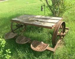 Table From Old Wagon Wheels And Tractor Seats