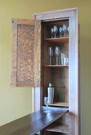 A drill is the only power tool you'll need. Murphy Bar Unique Liquor Cabinet And Bar Built From A Etsy Antique Ironing Boards Ironing Board Cabinet Old Home Remodel