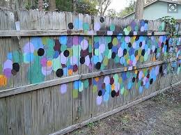 When it comes to your garden, you may wonder, how do i get started? you make a list that includes soil, plants and a water hose along with gardening tools. Fence Art 25 Pieces Of Art Using A Backyard Fence As The Canvas 100 Things 2 Do