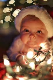Christmas Baby, Lights, Baby Girl by Marcela Limon. Photo stock