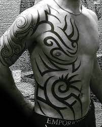 Tribal rib tattoos are really interesting because of their cool, imaginative and spiritualist nature. Top 40 Best Tribal Rib Tattoos For Men Manly Ink Design Ideas