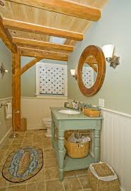 Create a sleek bathroom space with a new vanity from the home depot. Home Depot Woodbridge Va With Eclectic Bathroom And Basket Beadboard Custom Vanity Exposed Beams Green Half Bath Mint Reclaimed Vanity Round Mirror Rug Turned Legs Undermount Sink Window Shade Wood Ceiling