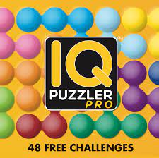The top of the game board features a grid for 2d challenges and a separate grid for 3d pyramid challenges, while the bottom of the board features a completely different 2d challenge grid. Iq Puzzler Pro Smartgames