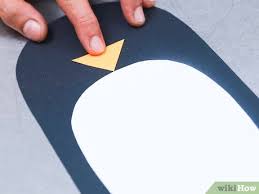 Instead of drawing the penguins, use this guide to cut out your own pieces to make your own penguins out of construction paper. How To Make A Paper Penguin With Pictures Wikihow