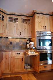 Some varieties of this wood look very knotty but are still smooth. Knotty Alder Kitchen Cabinets Pine Kitchen Cabinets Hickory Kitchen Cabinets Farmhouse Kitchen Cabinets
