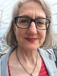 EVELYN SYMES READS A LETTER