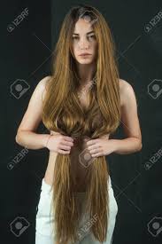 Also do a little research on some shampoos and conditioners that are on the market to see what fits your hair type. Girl Has No Makeup And Healthy Hair On Black Background Woman Stock Photo Picture And Royalty Free Image Image 88945211