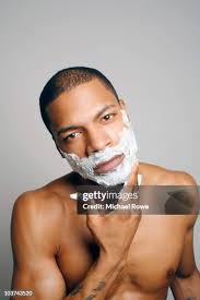 507 Young Adult Man Applying Shaving Cream Stock Photos, High-Res Pictures,  and Images