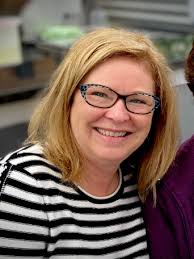 Our Team — the table.