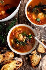 Dark green country floral dinner party menu. Seafood Cioppino With Charred Bread The Original Dish