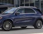 MercedesBenz GLE and GLS side by side comparison front view luxury SUV, buatan AI
