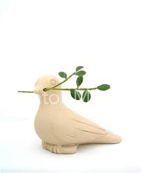 Lladro glossy porcelain figurine of two pigeons holding a white cloth full of handmade flowers. Dove Of Peace Figurine Catholic Gifts Art Creator Mundi