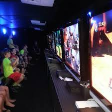 If you're looking for a fun and memorable celebration to give your child for their birthday or other special celebration, look no further than ultimate games! Video Game Bus Parties
