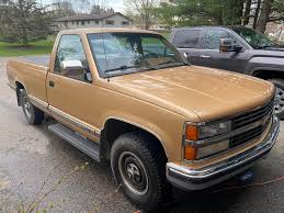 Image result for brown truck vs white truck