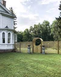 A vinyl lattice fence provides just the right amount of privacy and is easier to build than a standard picket fence. How To Build A Wooden Lattice Fence House Of Brinson