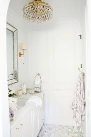 Brass is the finish of choice these days and if you're in the middle of a bathroom renovation, then you may be considering brass hardware and typically the sink top portion is made of marble, porcelain or a durable painted clay. Glam Transitional Guest Bathroom Reveal With Marble Silver And Brass