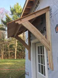 How to build a wooden awning for patio. Awning Barn Mortiseandtenon Cedar Porch Roof House Exterior Window Awnings