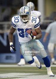 Demetris Summers Of The Dallas Cowboys Carries The Ball Before The Preseason Game Against The Seattle Seahaw Cowboys Vs Seahawks Cowboys Vs Dallas Cowboys Logo