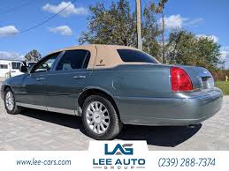 Image result for Light Ice Blue 2006 Town Car