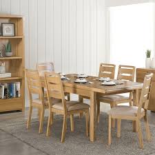 The ellie and eames extending dining set is all about complimentary curves and fashionable yet functional dining. Julian Bowen Curve Oak Extendable Dining Table And 6 Chairs Furniture123