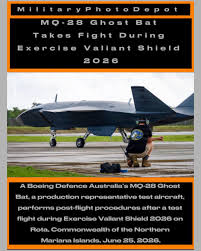 MQ-28 Ghost Bat takes flight during Exercise Valiant Shield 2026 (6 Images)  A Boeing Defence Australia's MQ-28 Ghost Bat, a production representative  test aircraft, gets towed towards a runway during Exercise Valiant