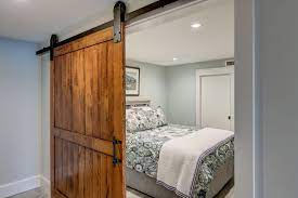 Sliding Barn Door For Guest Bedroom In Finished Basement Beach Style Bedroom Barn Kitchen Home