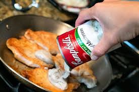 How To Make Pork Chops With Cream Of Mushroom Soup Ehow Com How To Cook Pork Cooking Pork Chops Stuffed Mushrooms