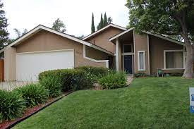 House Painted Using Dunn Edwards Sahara For The Body Modern Ivory For The Trim Whole Whe House Paint Exterior Farmhouse Style Exterior Farmhouse Paint Colors