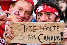 CURRENCY TRADING: Loonie Briefly Hits Parity