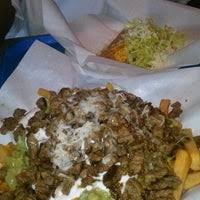 Three of the same tacos and a street corn. Taco Express Mexican Restaurant In Sacramento