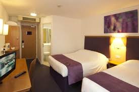 A very large hotel, especially for a premier inn, which features a large airy and open plan lobby. Premier Travel Inn Heathrow Airport Images