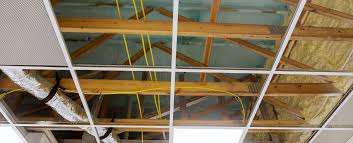 Gypsum boards are larger than ceiling tiles. False Ceiling Construction