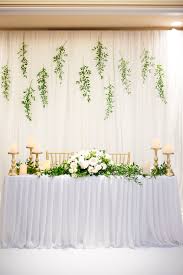 Simple Elegant Pleated Head Table With Italian Ruscus And Gold Candles Photo Da Photo Bridal Table Decorations Head Table Wedding Backdrop Head Table Wedding
