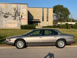 Image result for Medium Driftwood 1997 Chrysler