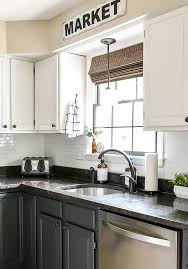 In addition to choosing a backsplash material you'll also need to choose an adhesive for those materials. How Are They Holding Up Smart Tile Backsplash Review Little House Of Four Creating A Beautiful Home One Thrifty Project At A Time How Are They Holding Up Smart Tile