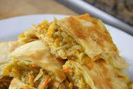 Pepper Roti Is So Given Its Name Simply Because Of The Amount Of Heat From The Hot Peppers That Are Added To Th Caribbean Recipes Trinidad Roti Gourmet Recipes