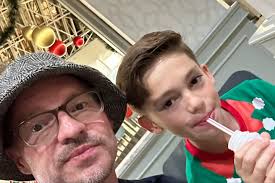 Three Little Dragons still aren't too proud to walk through the mall in  matching Christmas outfits (elves) to visit Santa and are rewarded with  HEAVILY sugar coated beignets afterward. The Thompsons hope