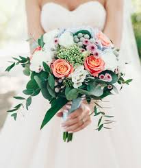 An arrangement of elegant white roses remains an classic favorite. The Best Roses For Wedding Bouquets Southern Living