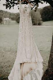 Whimsically Rustic In The Fall Bustld Rustic Barn Wedding In The Fall With Cowboy Boots An Rustic Wedding Dresses Farm Wedding Dresses Barn Wedding Dress