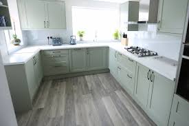 More dramatic shades of matt grey create instant impact, while the metallic shine of chrome and steel creates a clean, modern aesthetic. 75 Beautiful Vinyl Floor Kitchen With Green Cabinets Pictures Ideas July 2021 Houzz