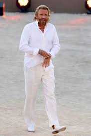 Michael mann's edict of no earthtones aptly reflected the white. Promi Looks Die Skurrilsten Outfits Aus Wetten Dass Brigitte De