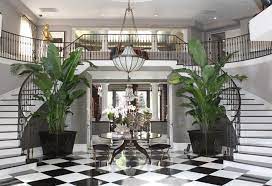 37 Zoom Background Ideas To Make Your Guests Lol Including Kris Jenner S House Staircase Design Double Staircase Foyer Decorating