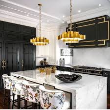 Black And Gold Kitchen Design Ideas A Black And Gold Kitchen With Butterflies On The Upholstered Bar Stools Omggggg So Many Small Details That Home Decor Kitchen Kitchen Interior House Design
