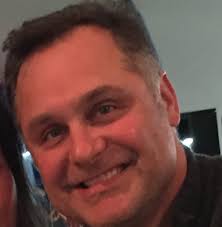 What is the manufacturer and model of this hoist and how to adjust its load  brake?