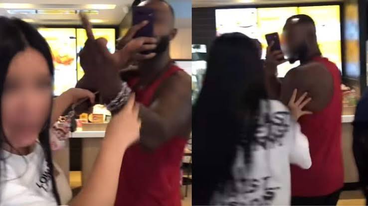 Foreign man and Thai woman clash over swastika tattoo